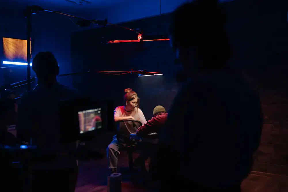 Professional team analyzing gameplay in a private bootcamp room